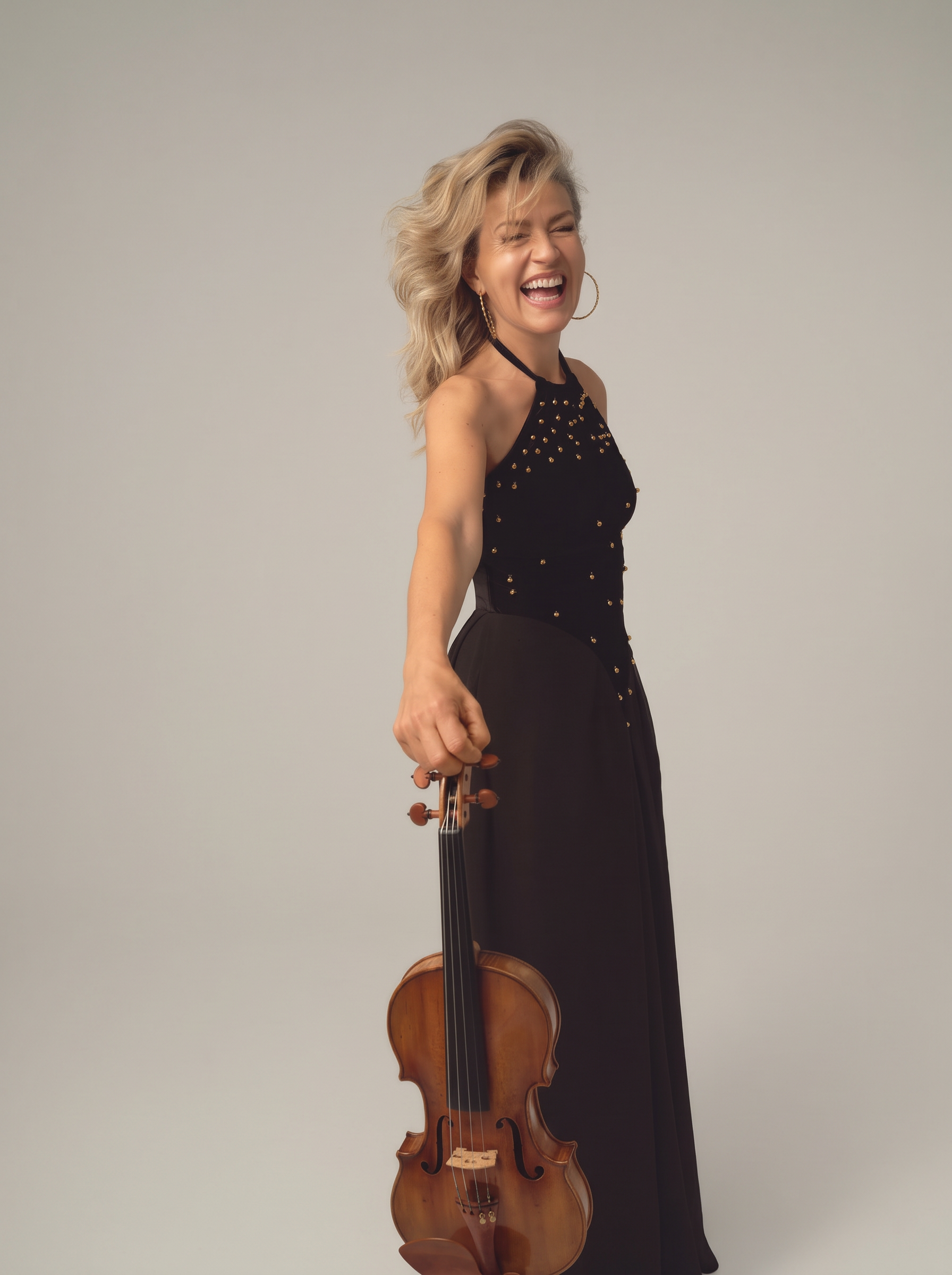 Anne-Sophie Mutter, lachend met haar viool